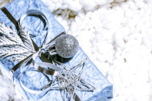 present wrapped with Silver and blue decorations