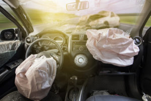 Everything You Need to Know About Airbags Auto Body Shop | Collision Repair Experts – Fix Auto USA Image an interior of a car that just got into a car accident with airbags deployed